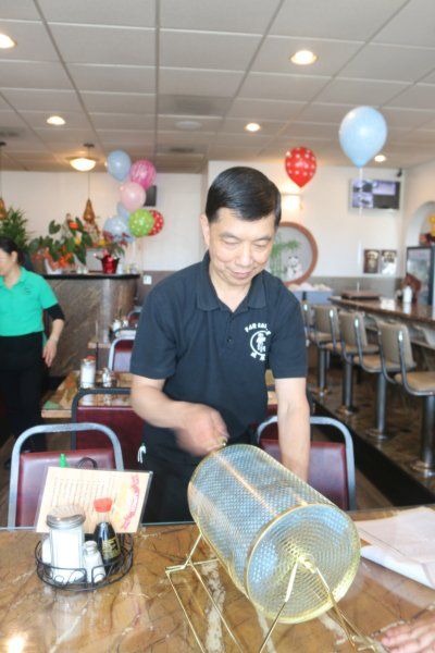 Chinese Man Spinning The Roulette Cage - Sacramento, CA - Far East Café
