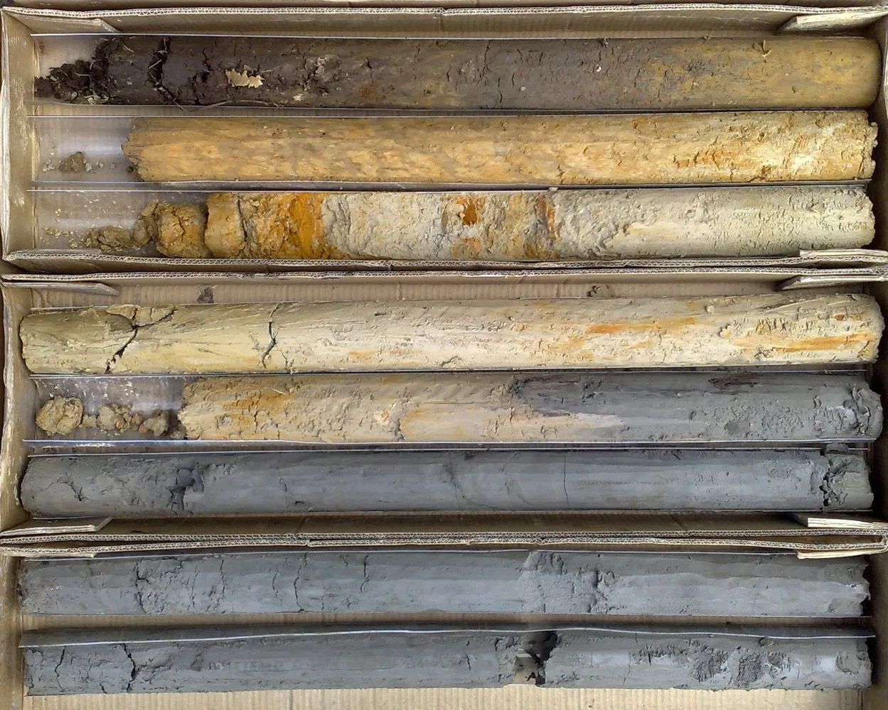 A bunch of different colored sticks stacked on top of each other
