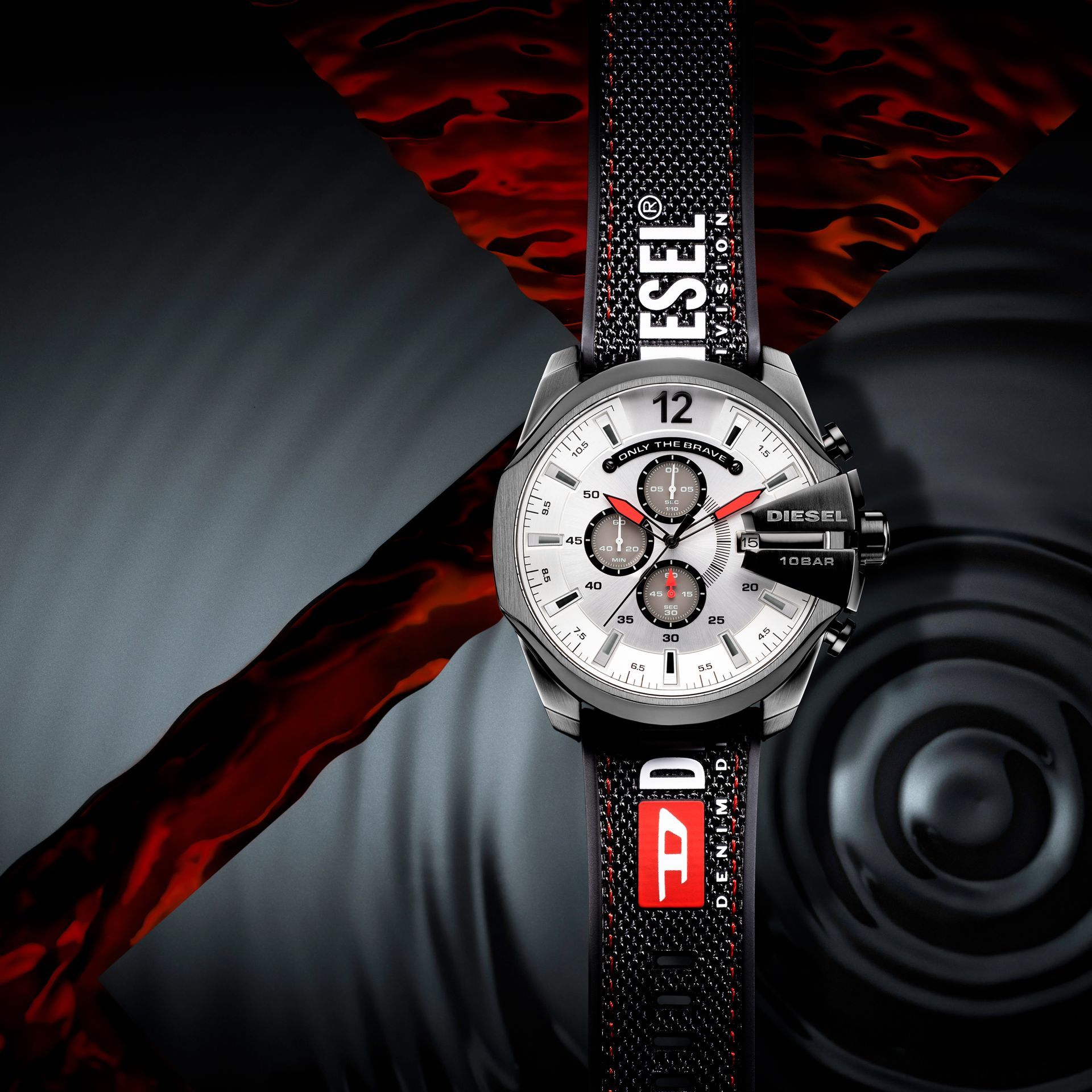 Diver watch in water — commercial still life photography by Krzysztof Czernecki