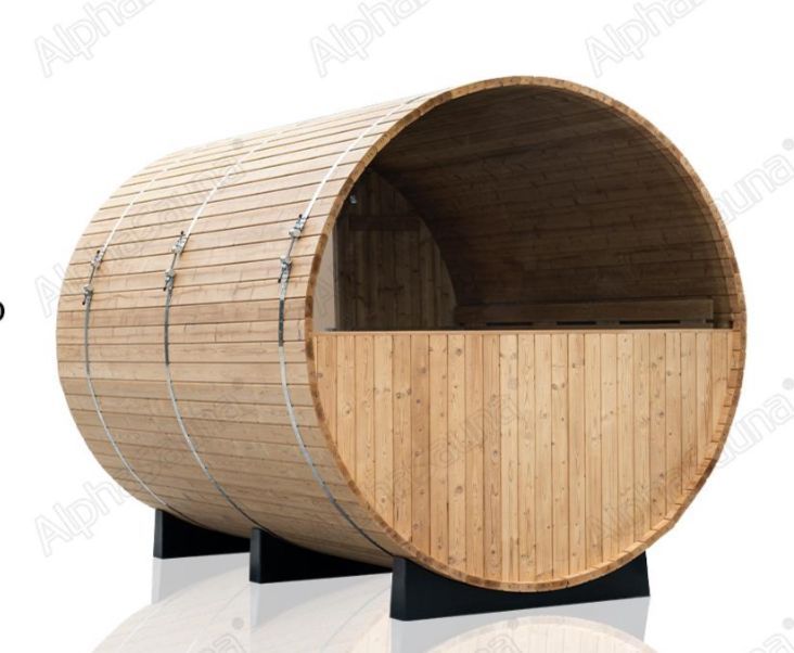 Barrel-shaped outdoor sauna made of light wood in a garden, with a curved door and green lawn.