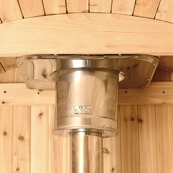 Stainless steel vent pipe and chimney cap inside a wooden ceiling opening