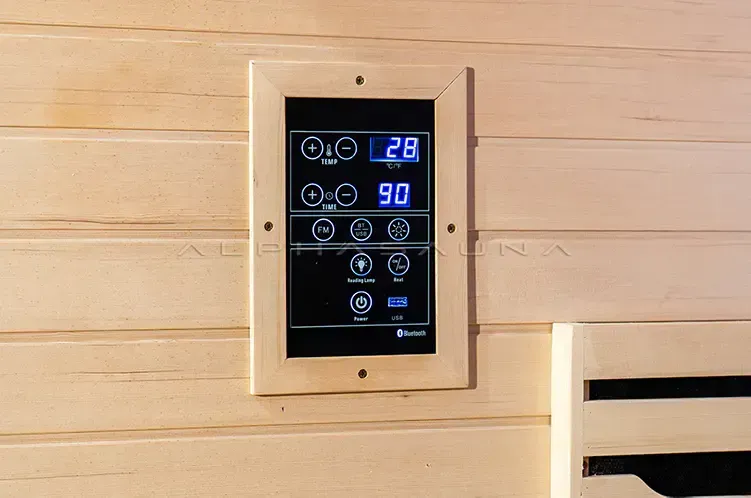 Wood-paneled wall with a digital thermostat control panel displaying blue numbers.