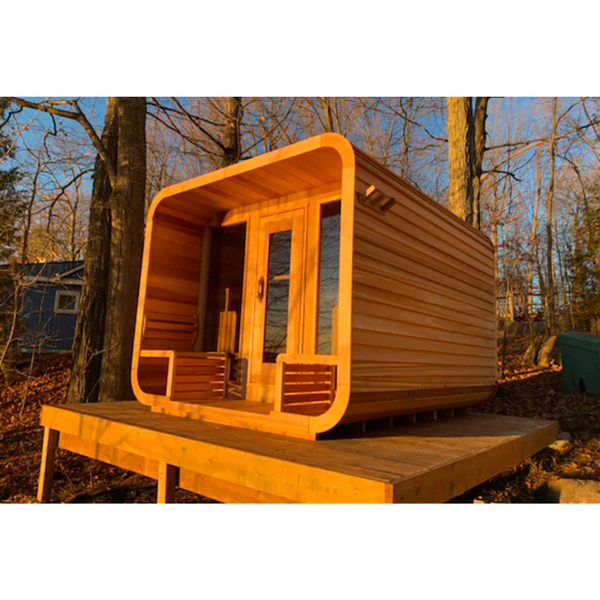 Wooden barrel-shaped tiny house with a front door and small benches, shown in side view on a white background