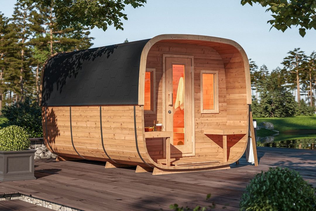 Cutaway wooden beehive with compartments and black roof, viewed from above
