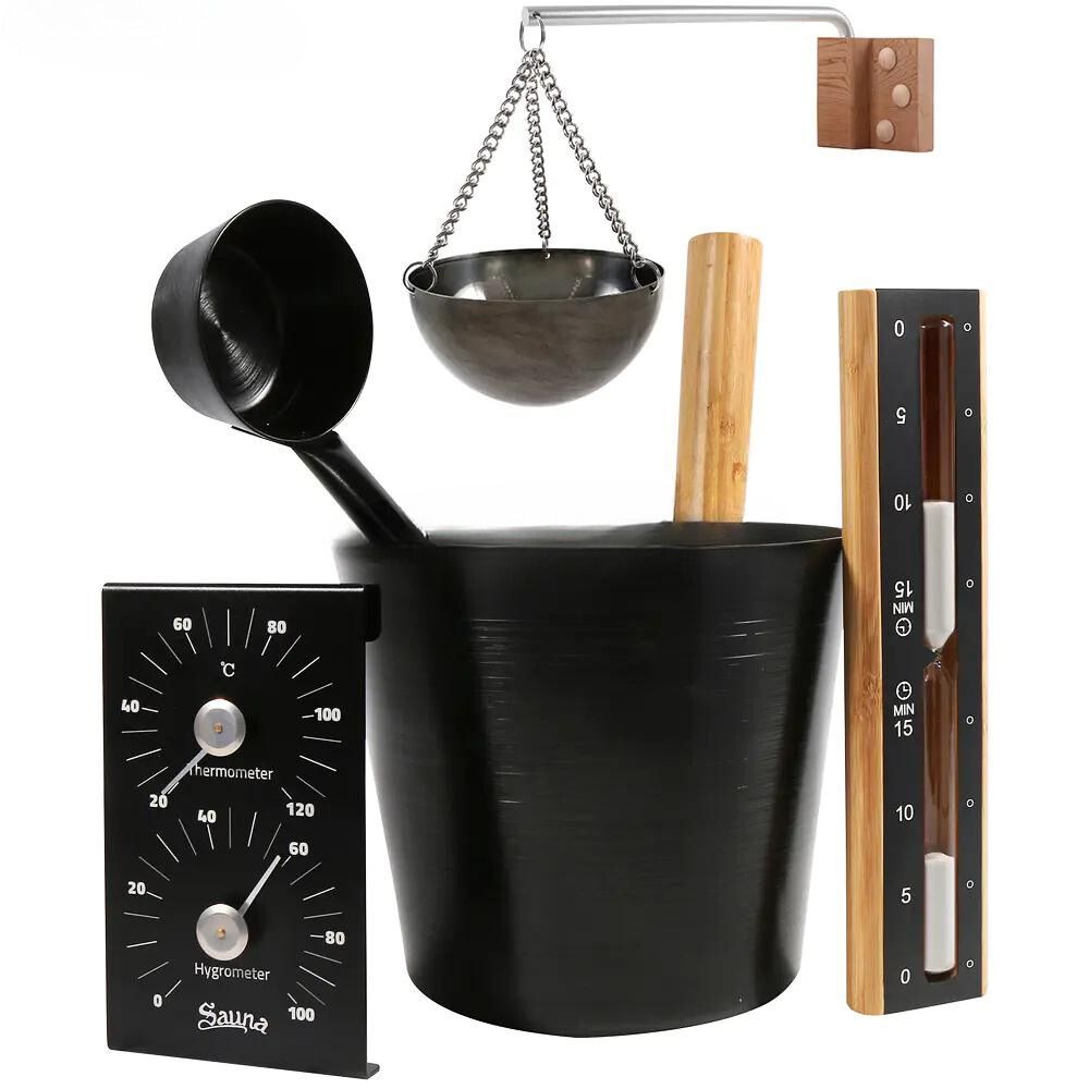 Assorted blacksmith tools: ladle, crucible, hammer, tongs, and measuring gauges on white background