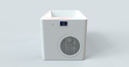 White boxy appliance with a circular vent on the front, shown against a plain background
