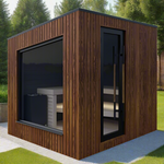 Small modern wooden shed with large windows and a black-framed door on a grassy lawn