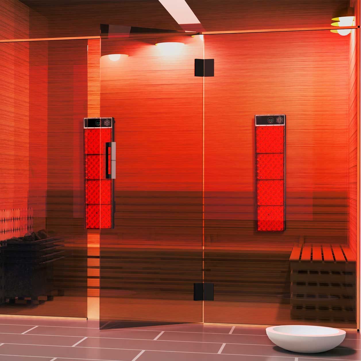Modern red-tinted bathroom with glass shower doors, two wall fixtures, and a white bowl sink