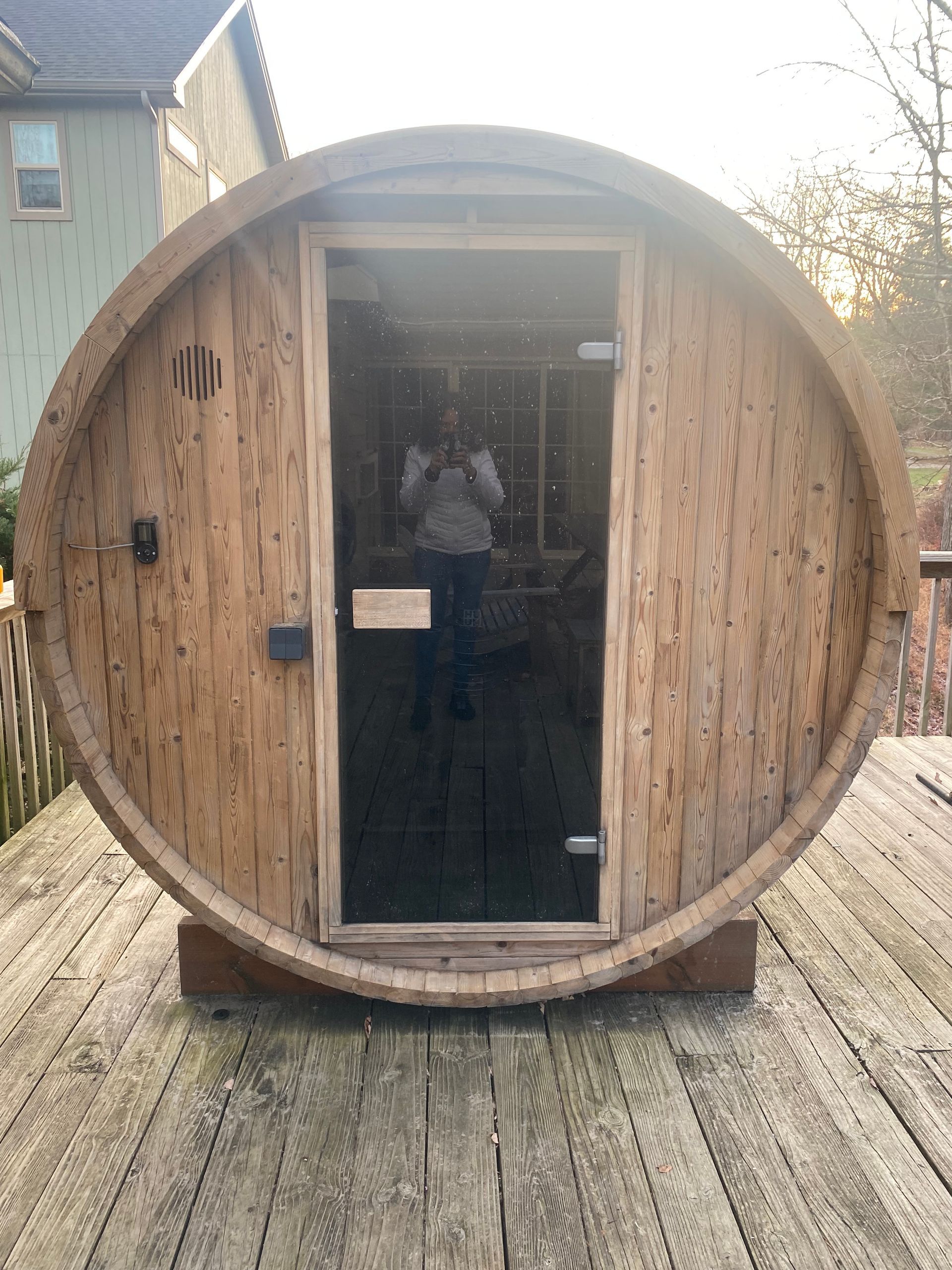 Outdoor barrel sauna in Lake Harmony. Designed and built by Uforia Sauna