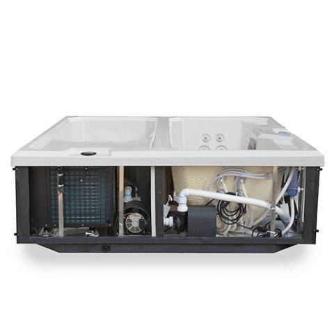 Broken dishwasher with front panel removed, exposing internal components and wiring.