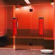Tall red patterned freestanding display on a black base, shown in two angled views with dimension labels.