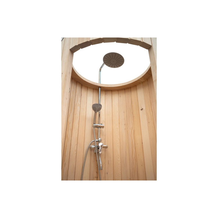 Wood-paneled outdoor shower with a round showerhead and wooden fence walls