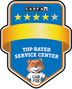 CARFAX Top-Rated Service Center badge in blue, yellow, and orange with Car Fox mascot  | Clark's Tire & Automotive