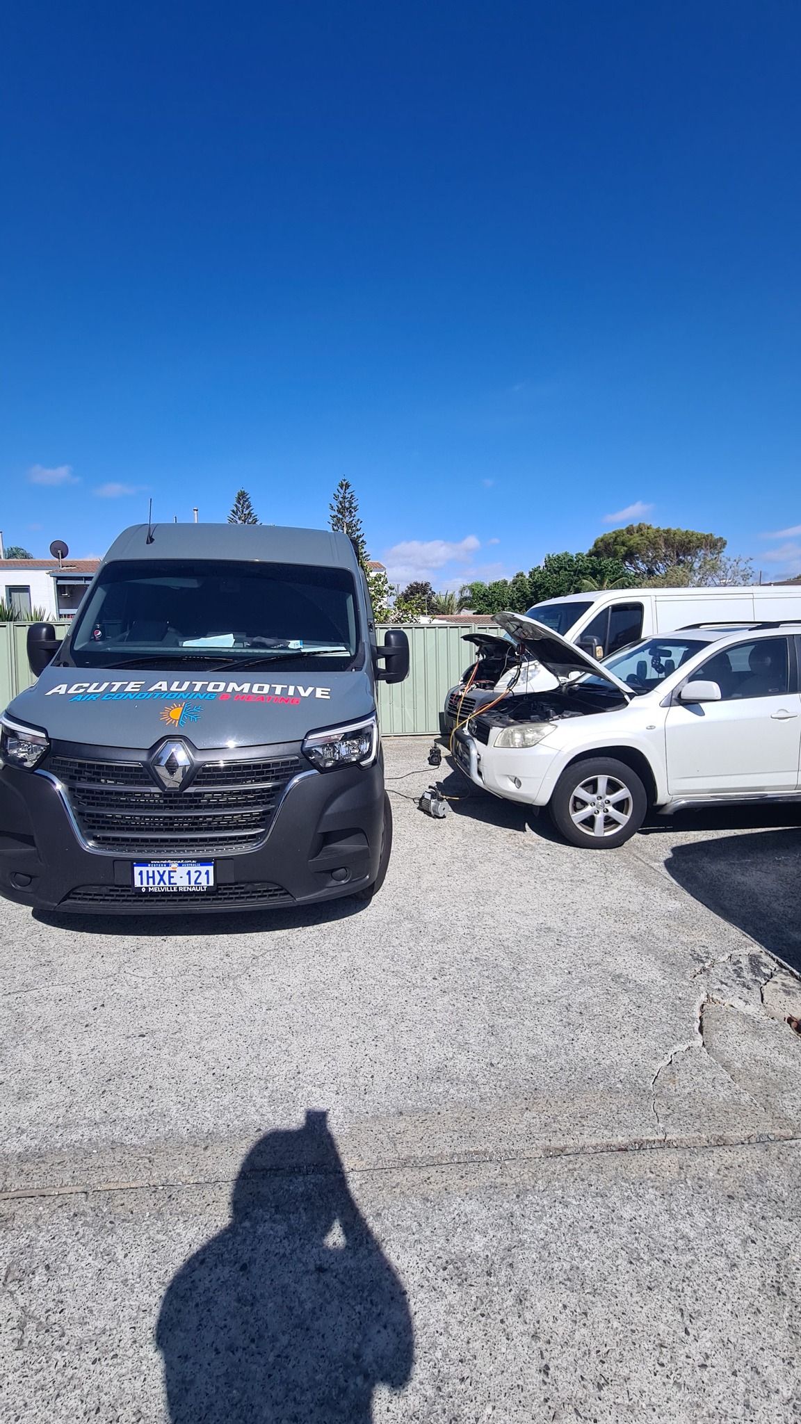 A renault van is parked in a parking lot.