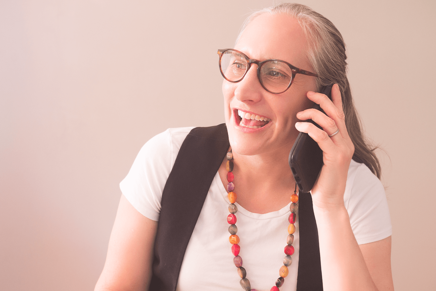 Sally Morris headshot on mobile phone promo photo