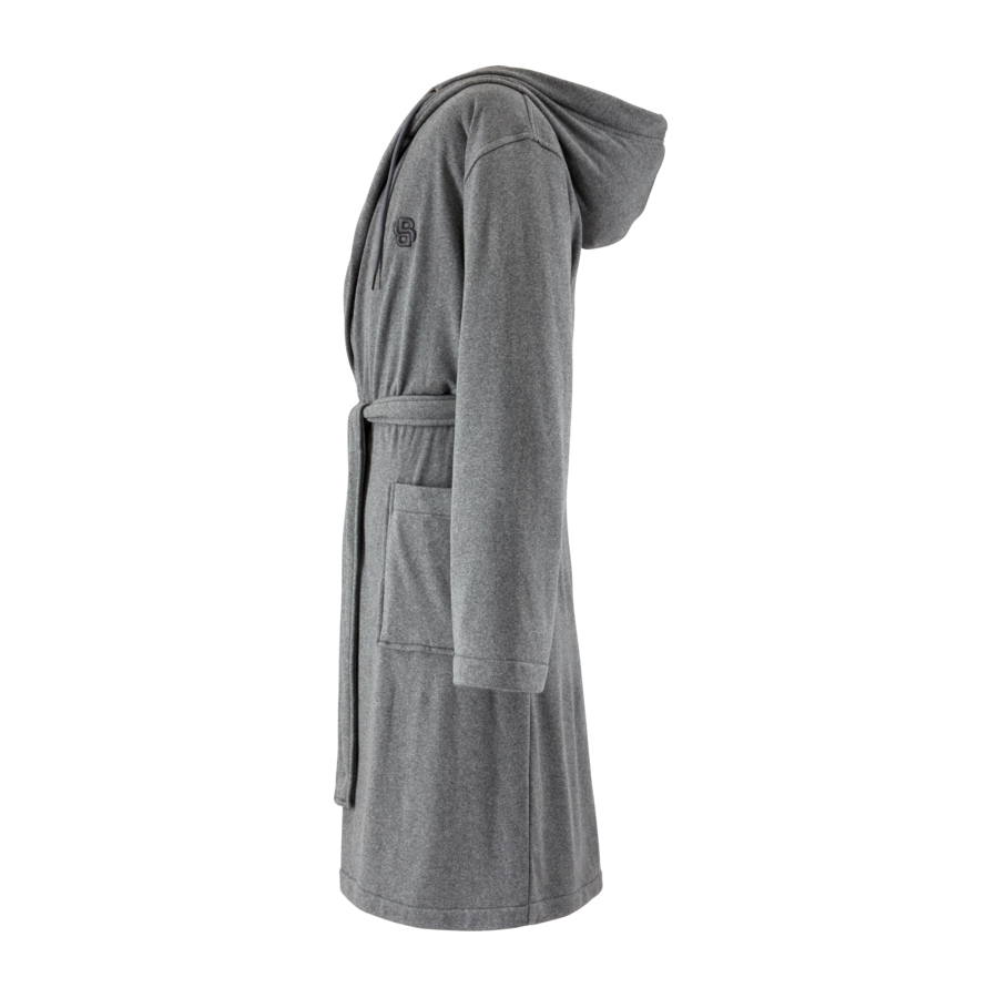 Une robe grise avec une capuche et des poches sur fond blanc
