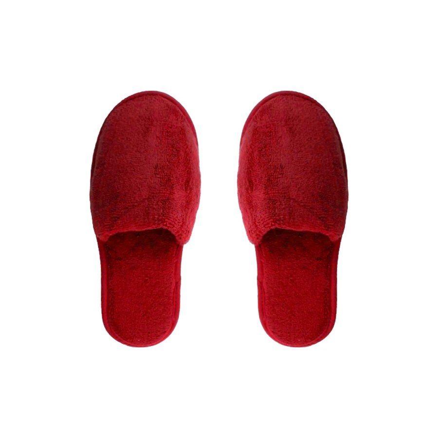 Une paire de pantoufles rouges sur fond blanc