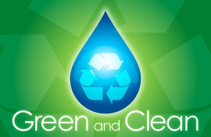 Blue water droplet with recycle symbol on a green background, with the words “Green and Clean”