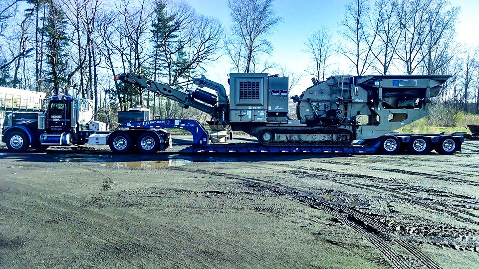 Trombly truck with step deck trailer