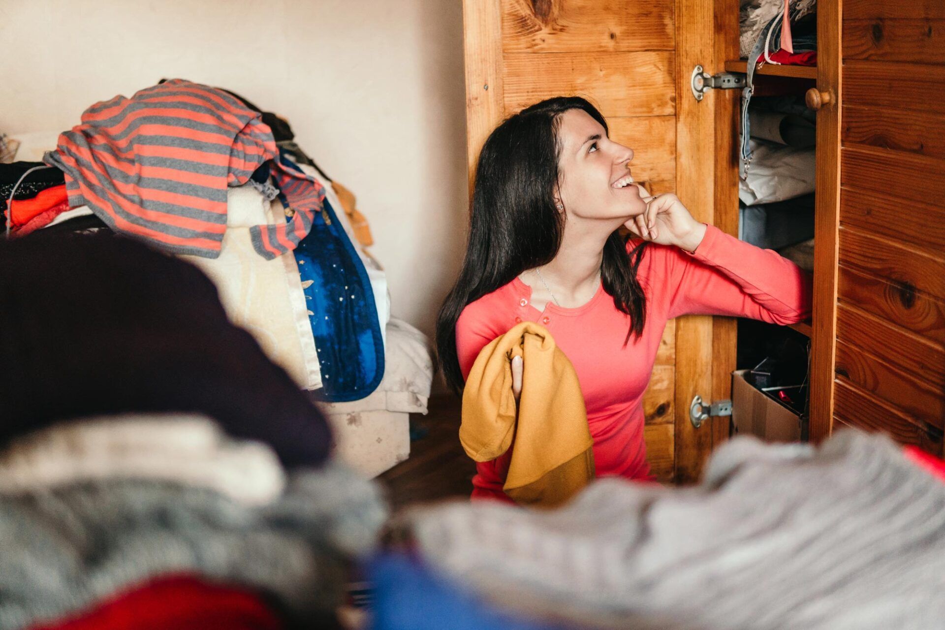 Woman Looking In The Cabinet — Brownsburg, IN — Brownsburg Self Storage Locker Inc