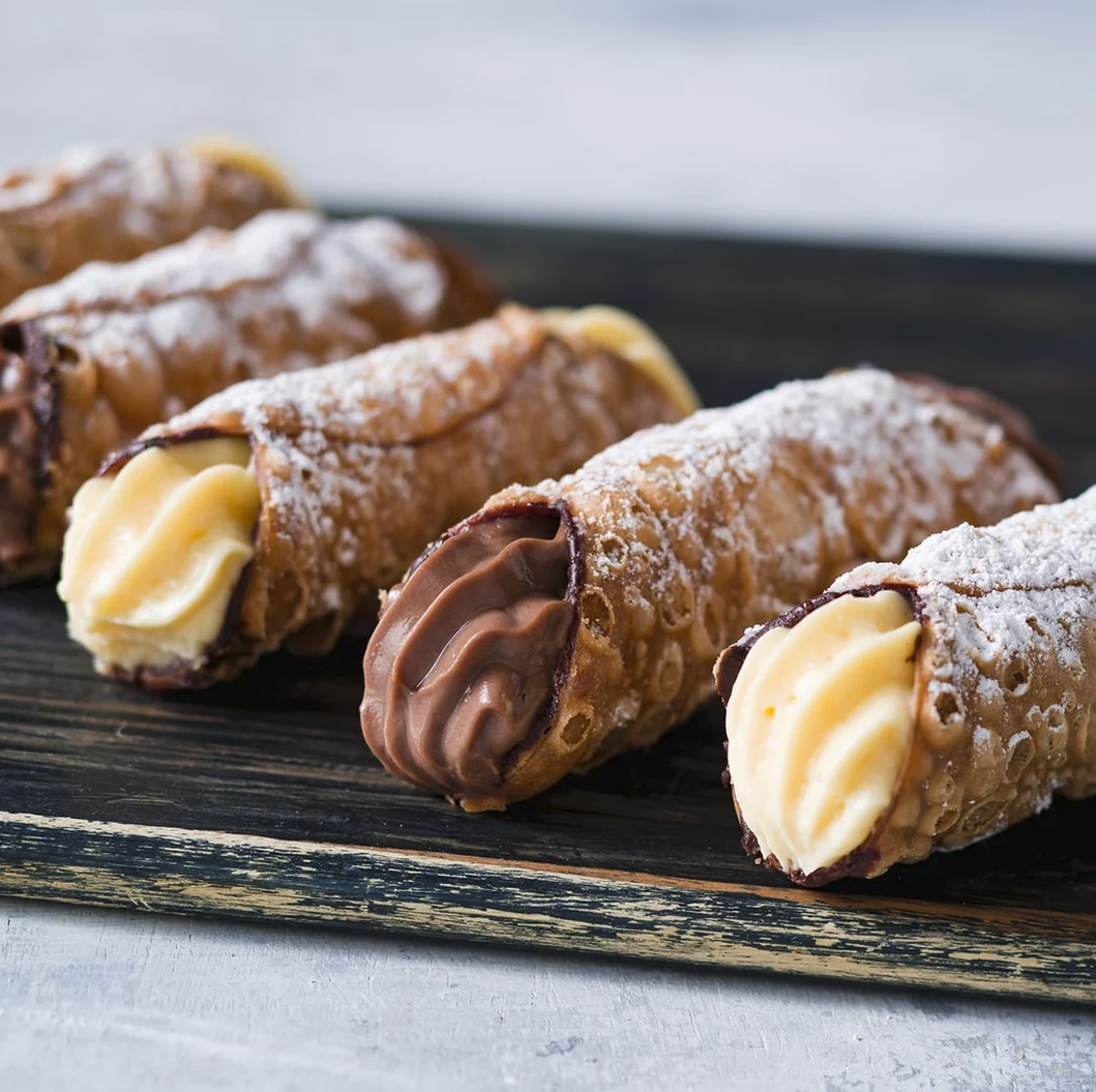 Chocolate and vanilla cannoli served for Pasta Face cocktail catering