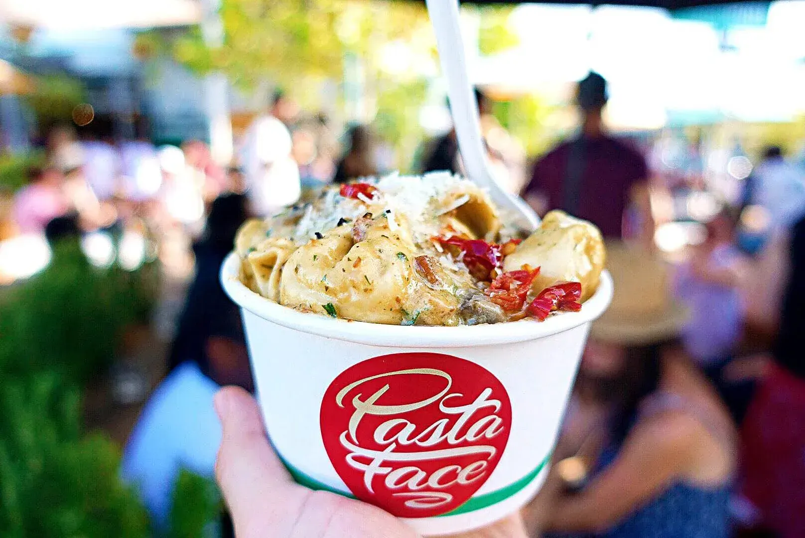Truffle wild mushroom chicken tortellini served in a Pasta Face cup