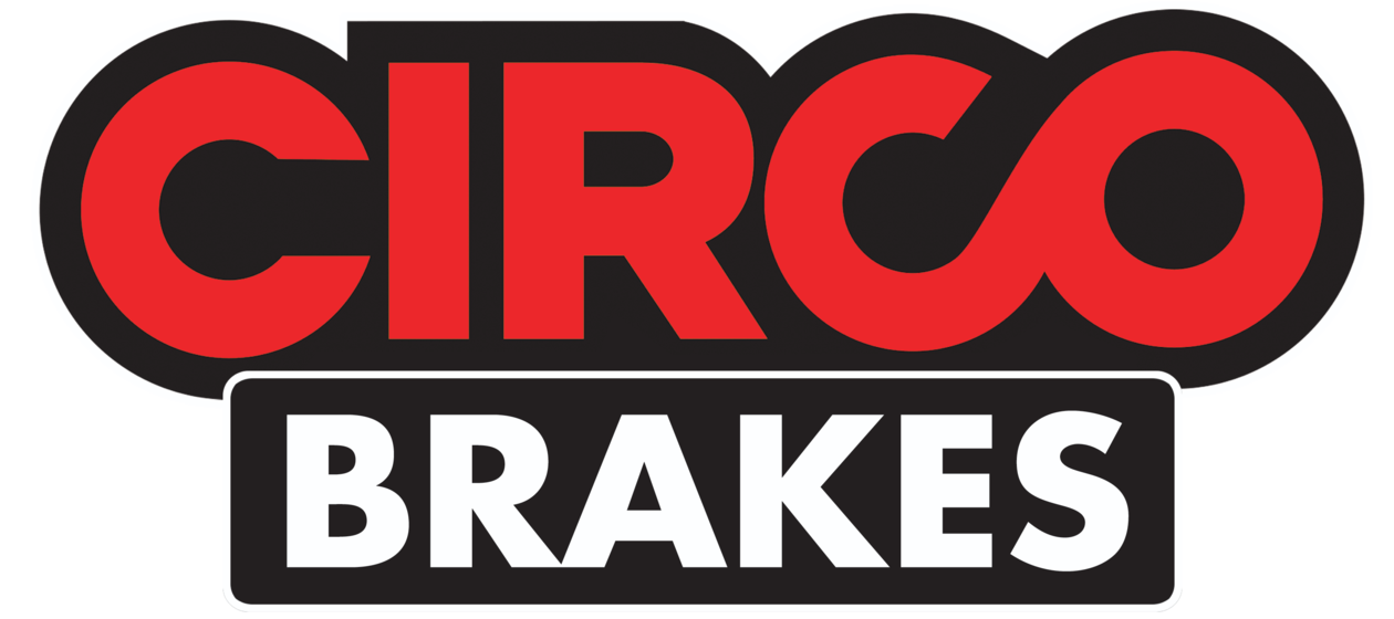 A man is fixing a brake disc on a car.