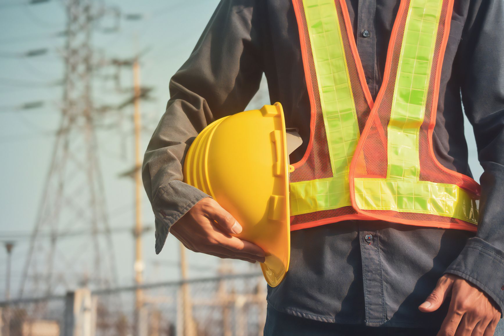 Man Holding A Hard Hat — Cemak Constructions in Toormina, NSW