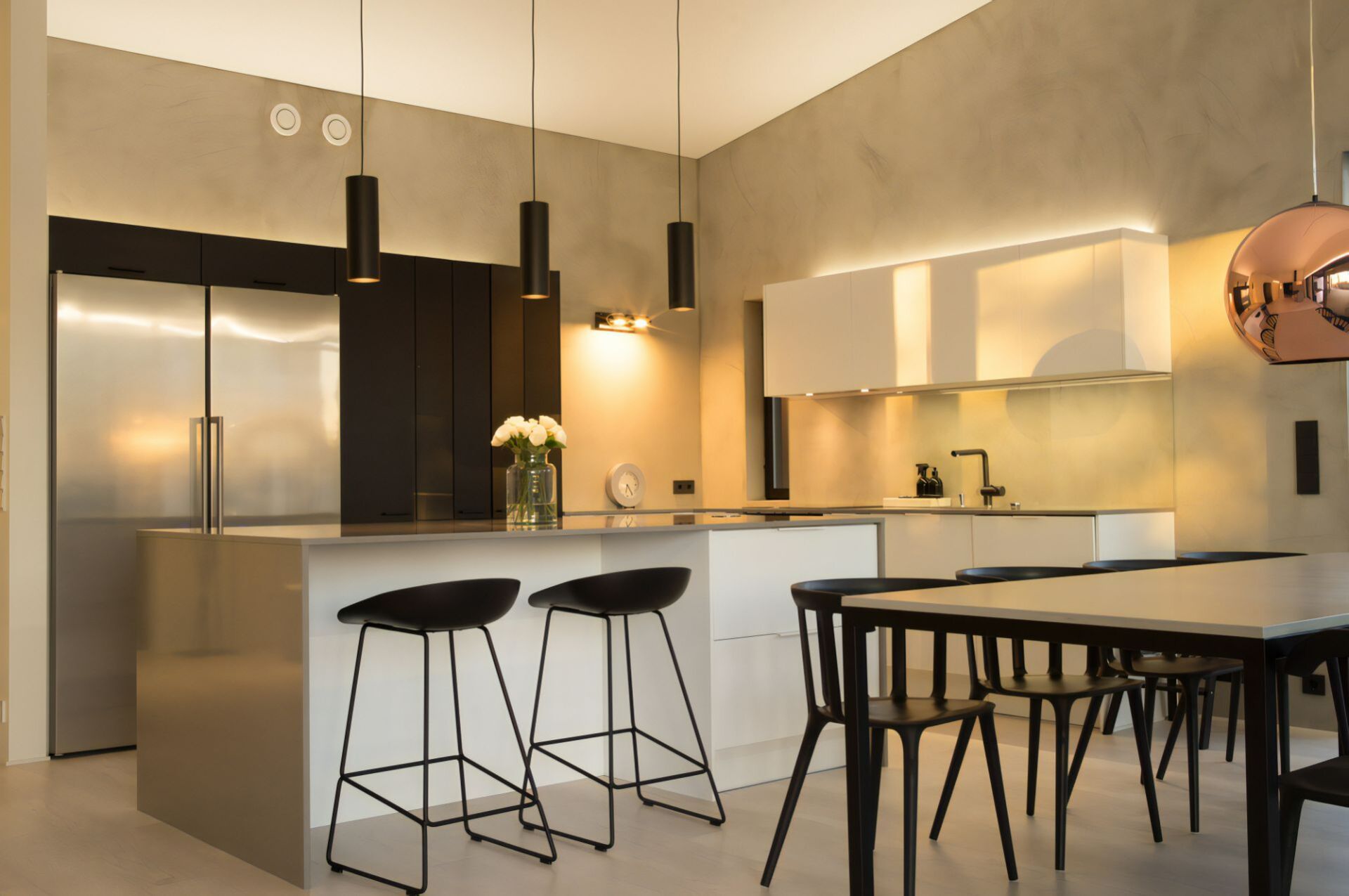 A Kitchen with Stools, a Table and A Refrigerator — Cemak Constructions in Port Macquarie, NSW