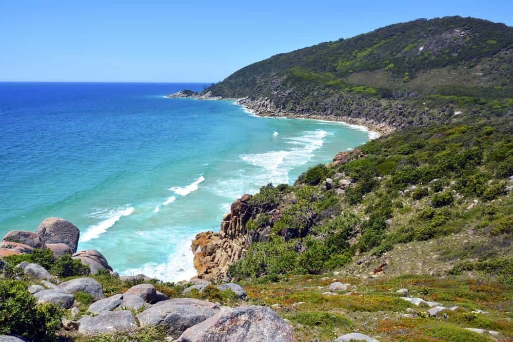 A View of A Beach from A Cliff Overlooking the Ocean — Cemak Constructions in South West Rocks, NSW