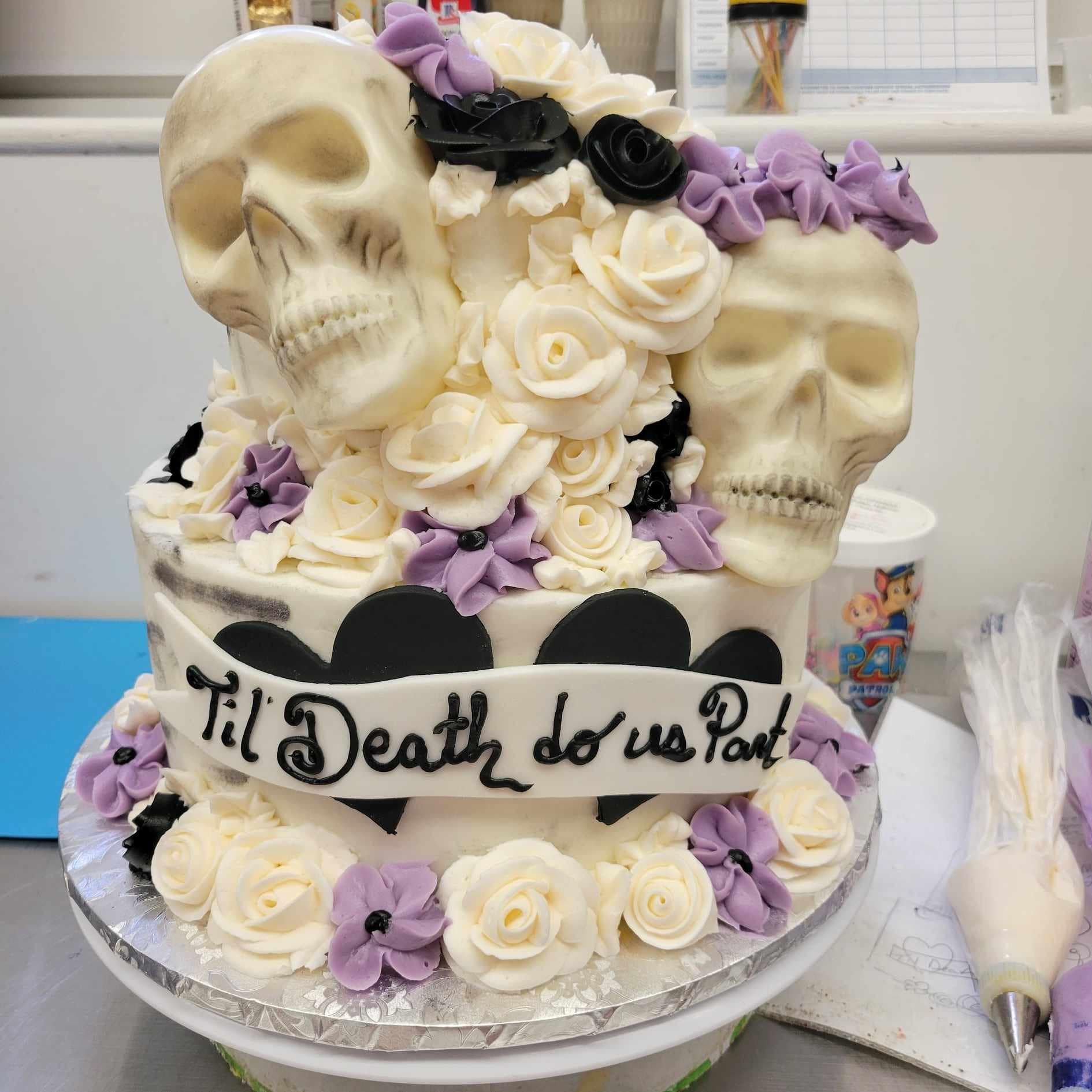 til death do us part wedding cake with skulls