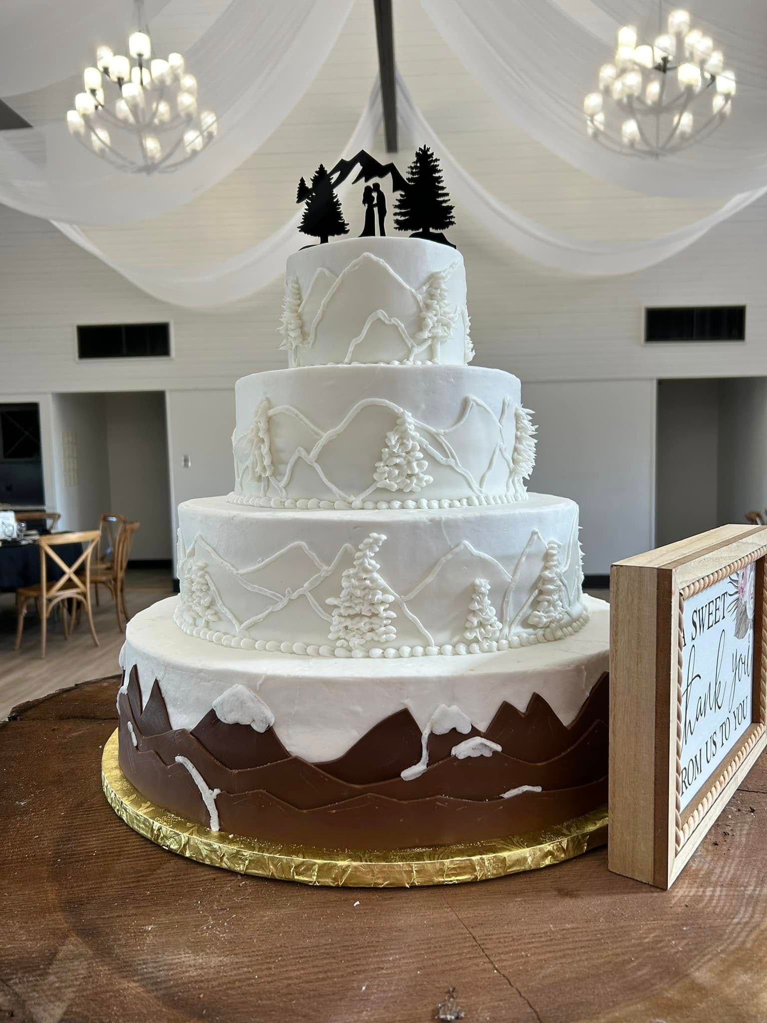 mountain themed wedding cake
