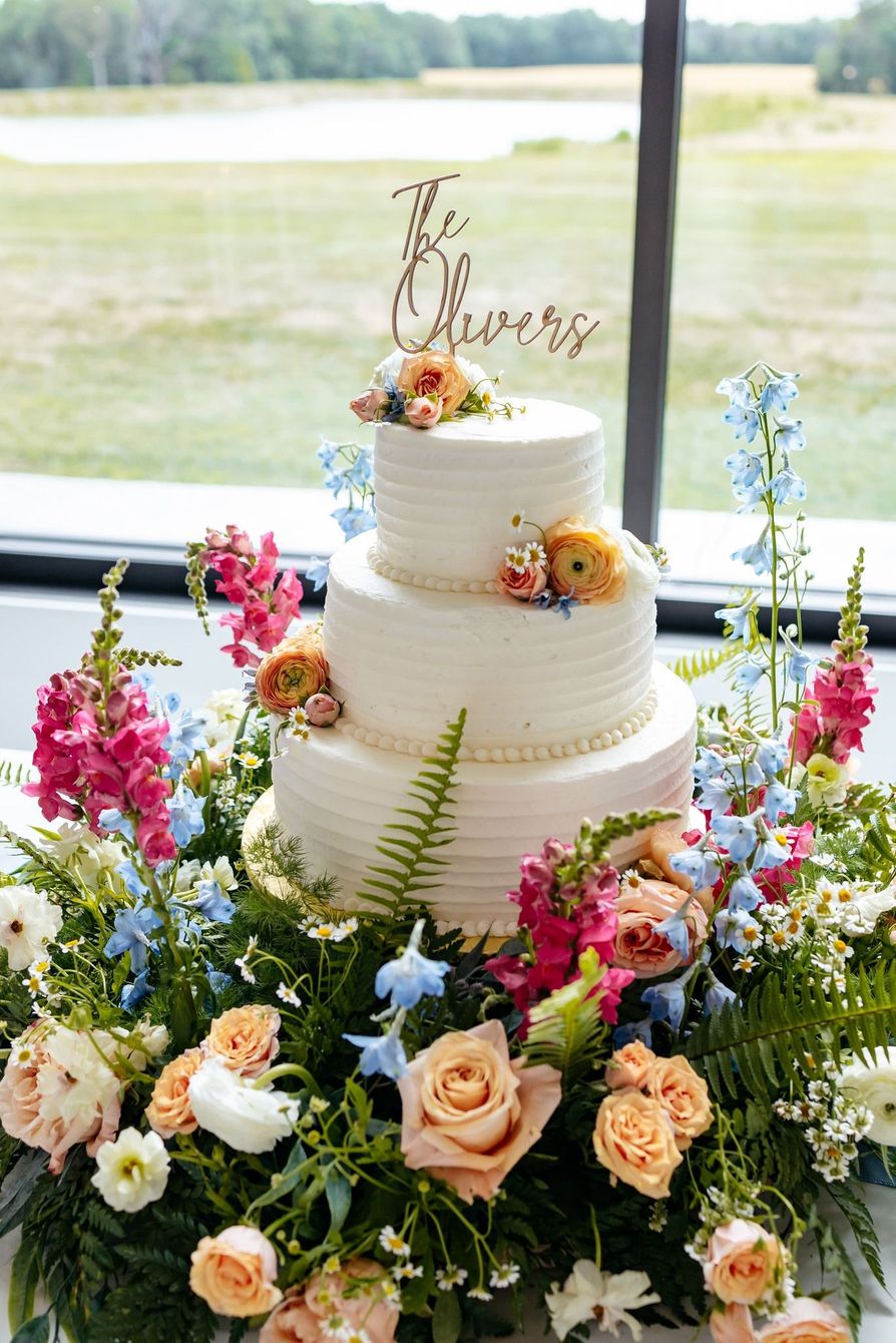 three tier wedding cake with flowers