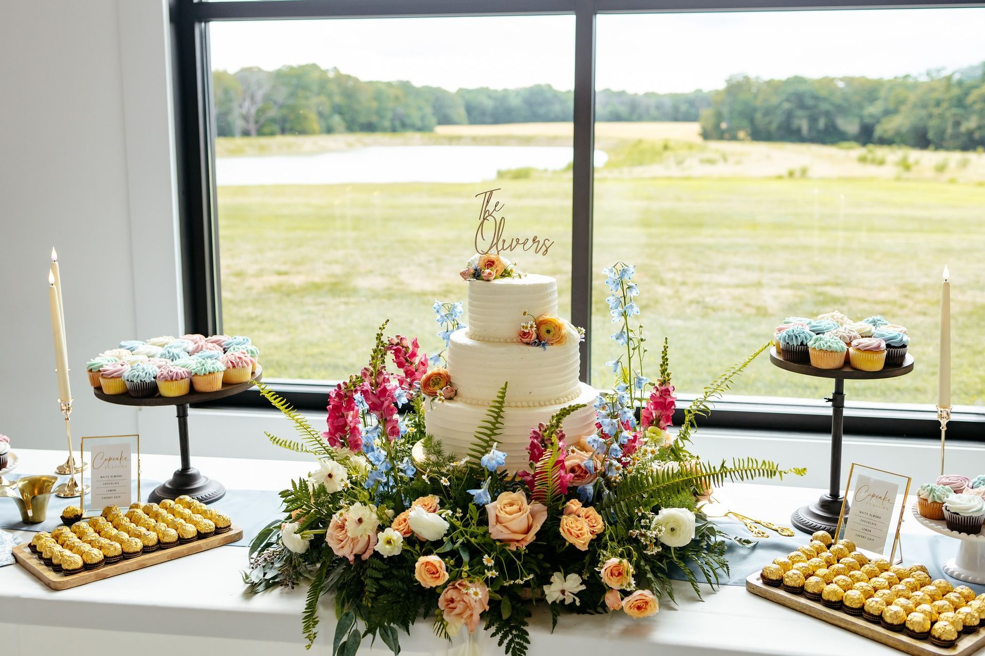 wedding cake and cupcakes