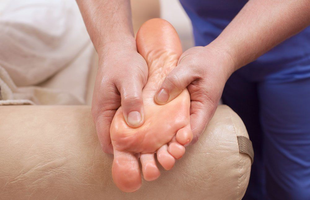 Podiatrist Examining Foot — Podiatry In Forster, NSW