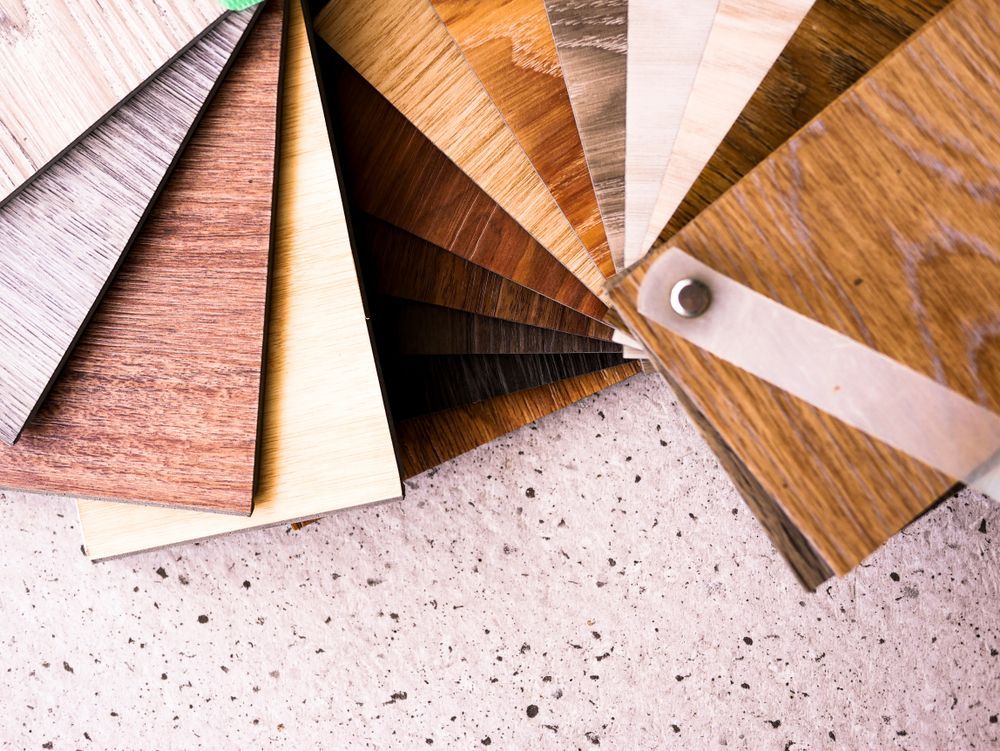 Catalog Stack Of Luxury Vinyl Floor Tile For New Home — B2B Flooring Solutions In Coffs Harbour, NSW