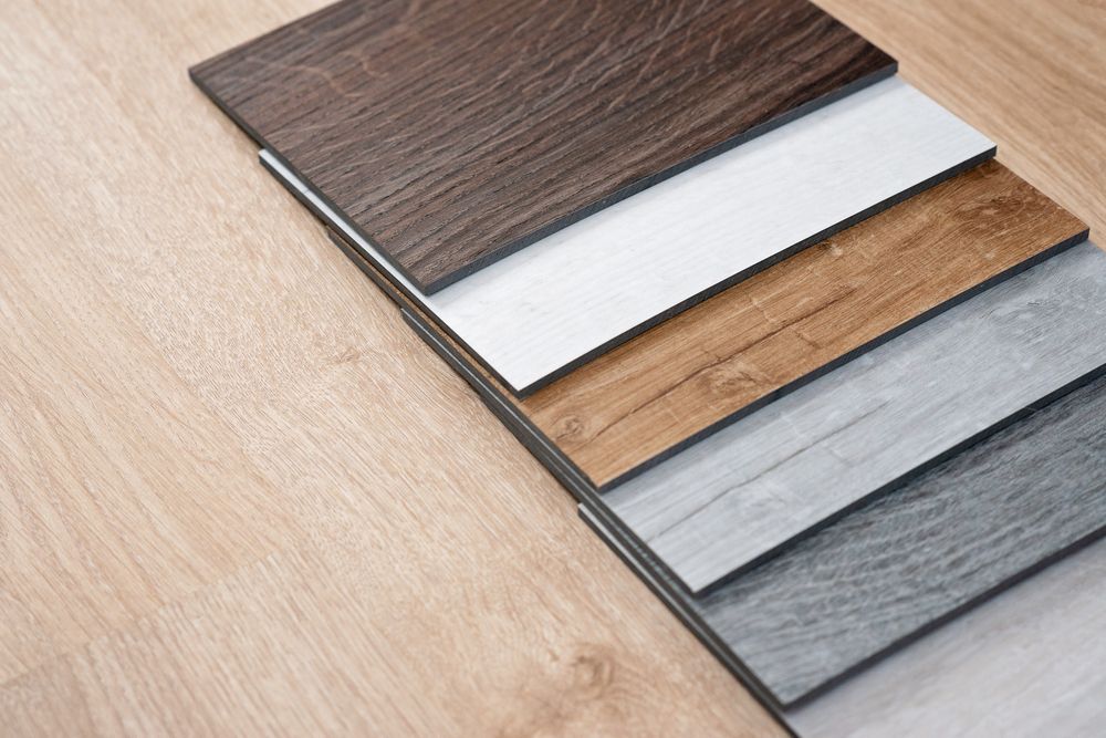 Sample Catalog Of Luxury Vinyl Laminate Floor Tiles With A New Interior Design For A House Or Floor On A Light Wooden — B2B Flooring Solutions In Yamba, NSW