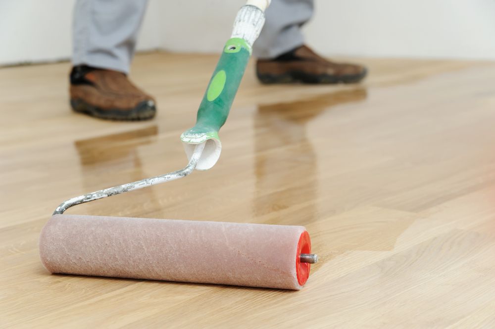 Lacquering Wood Floors Use Roller For Coating Floors — B2B Flooring Solutions In Yamba, NSW