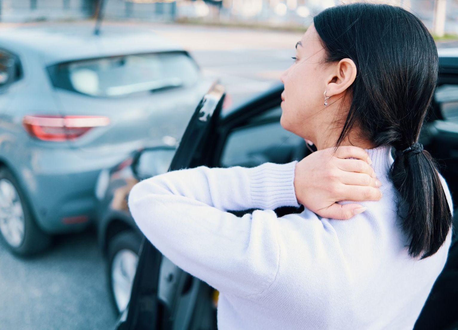 woman with neck pain after motor vehicle collision