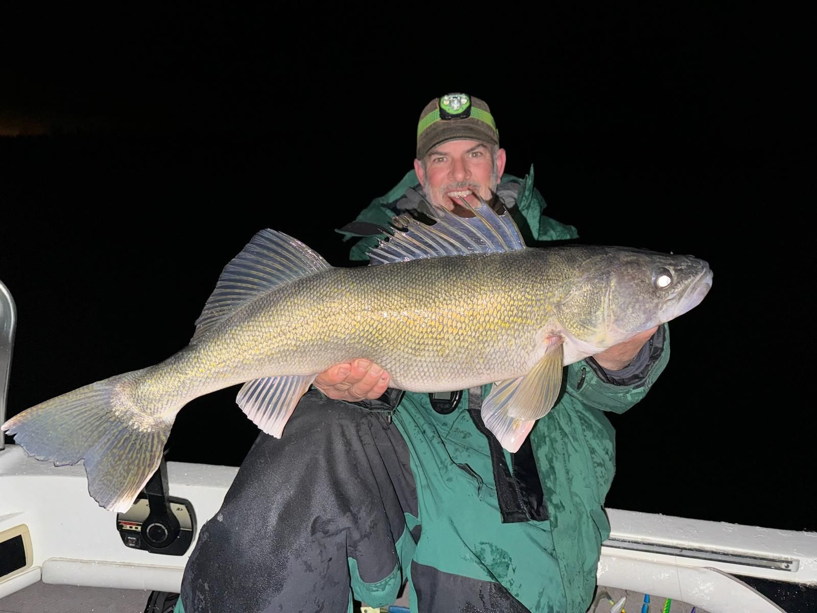 big walleye in lake at lakehouse
