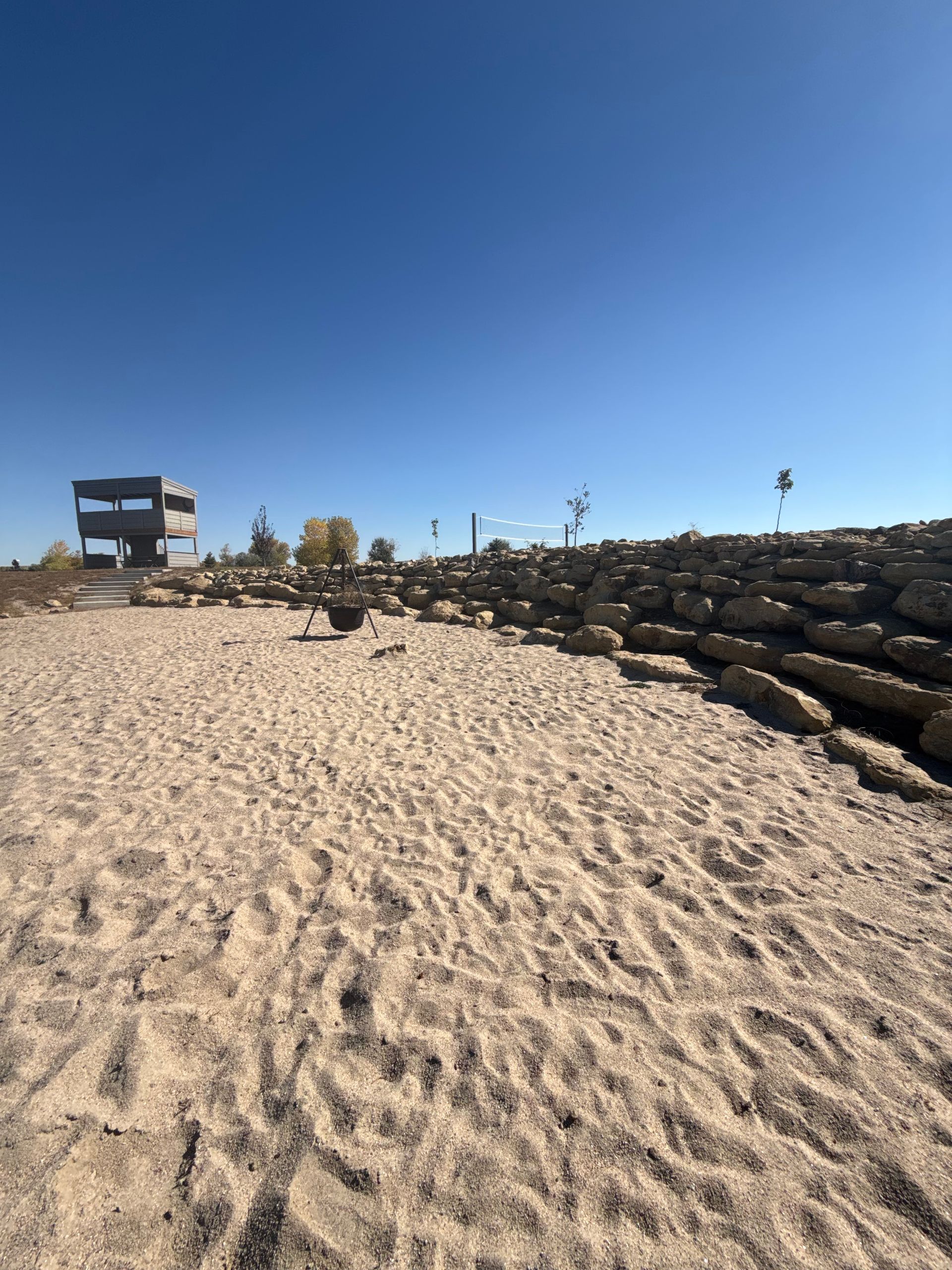 sand beach with firepit