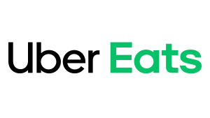 El logotipo de Uber Eats es negro y verde sobre un fondo blanco.