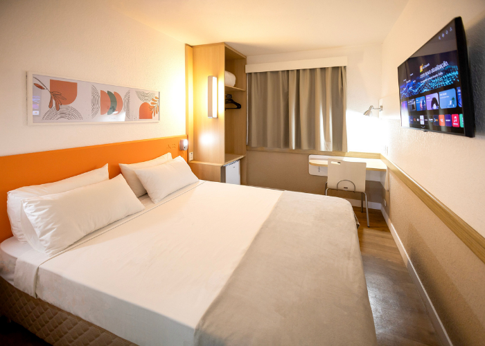 Apartamento do Hus Hotel Maringá para hospedagem durante viagem de inverno.