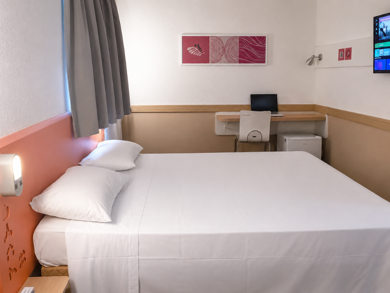 Quarto confortável do Hus Hotel Maringá