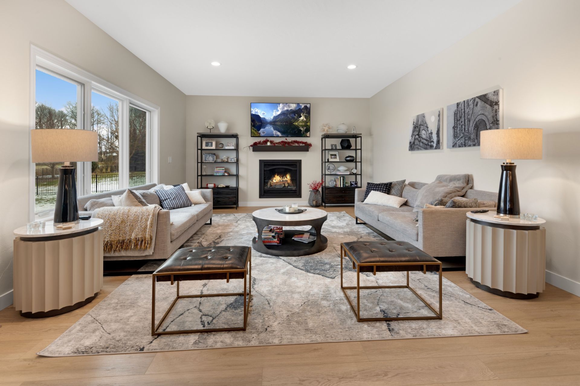 A living room filled with furniture and a fireplace.
