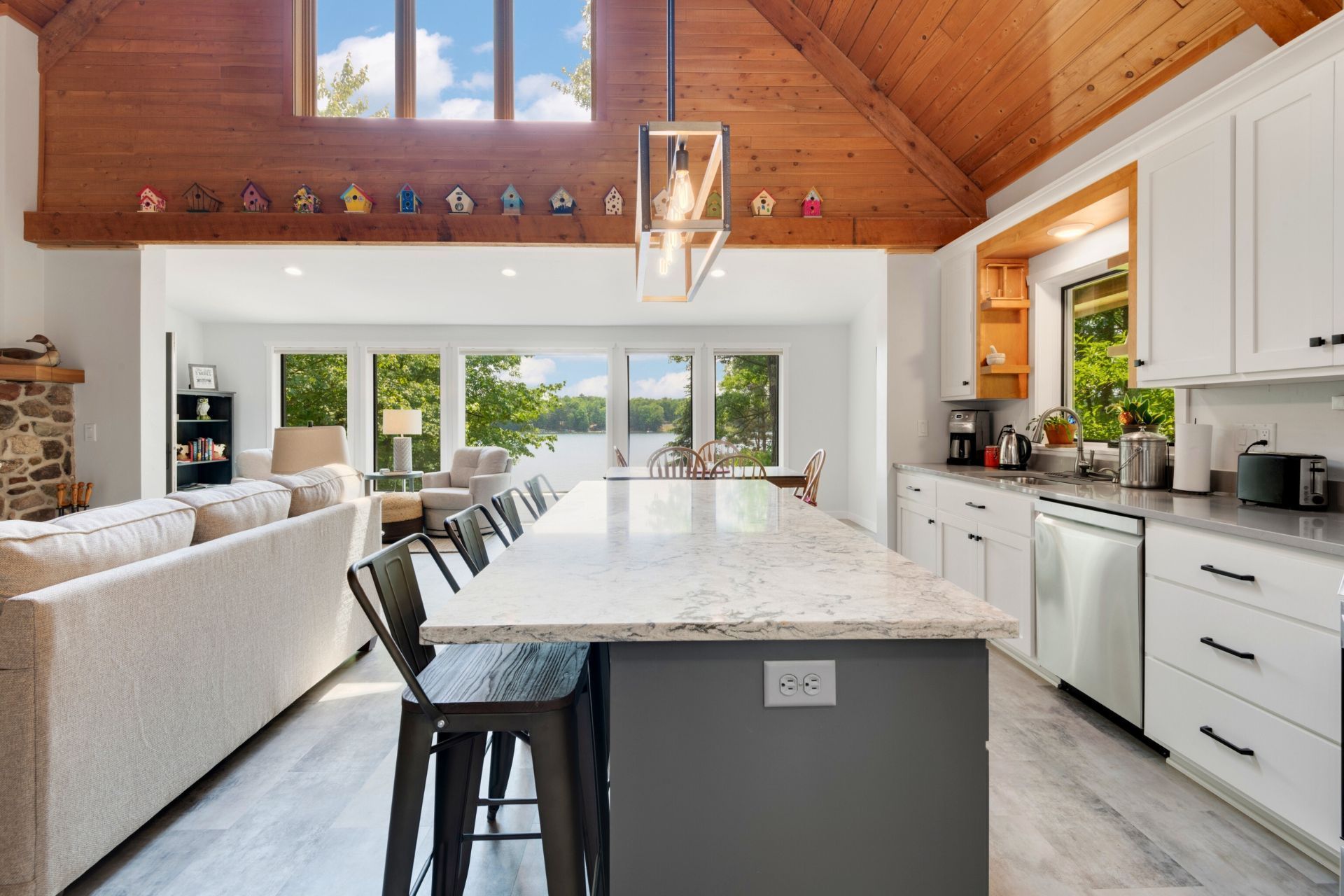 A kitchen with a large island in the middle of the room.