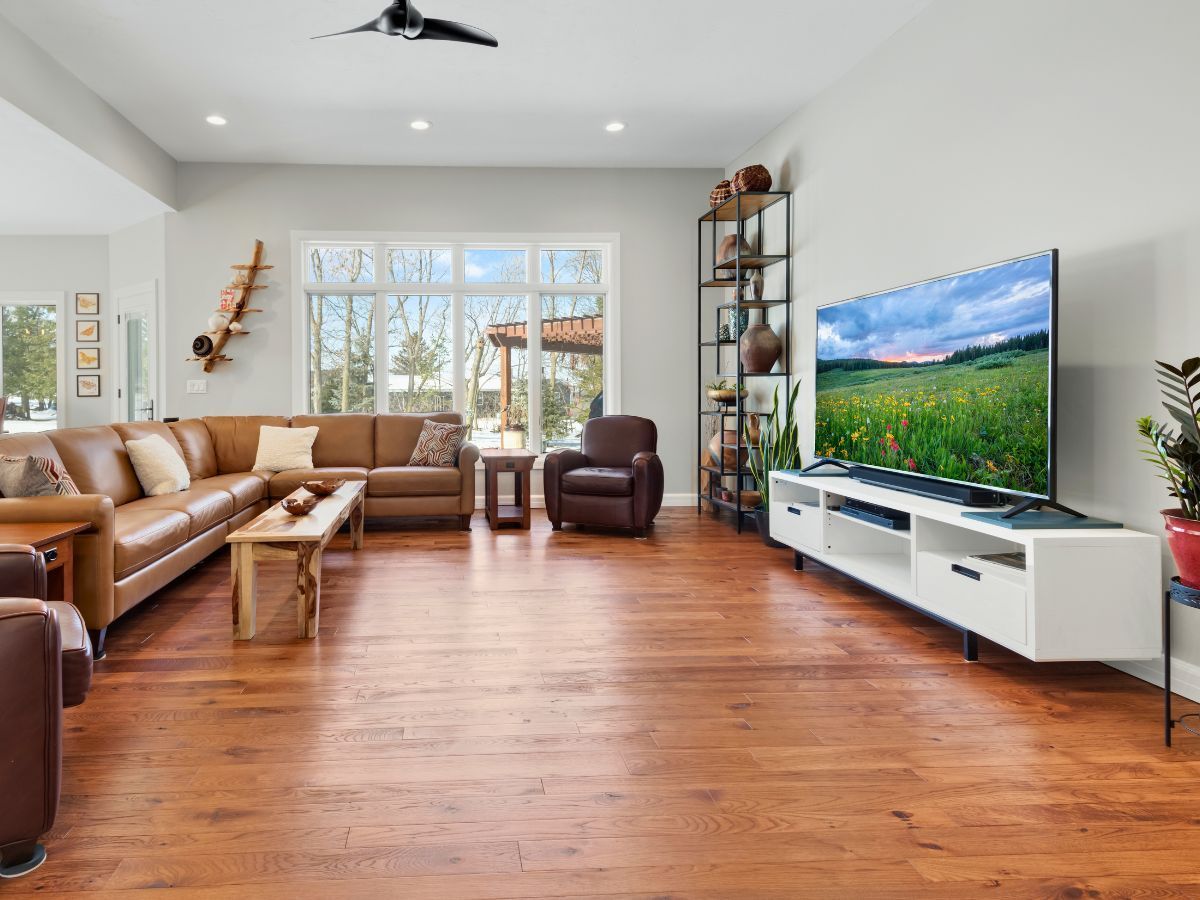 A living room filled with furniture and a flat screen tv.