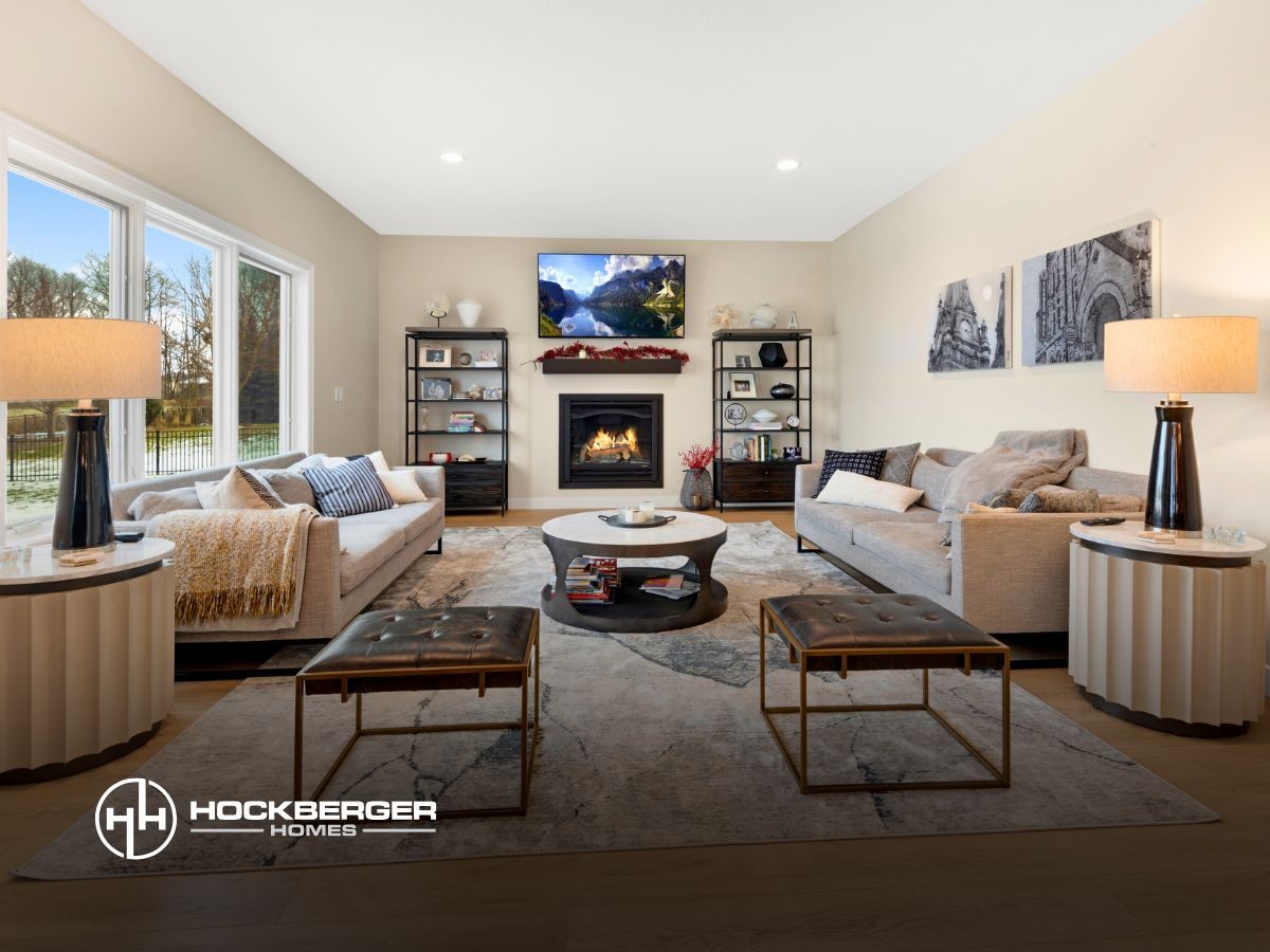 A living room filled with furniture and a fireplace.
