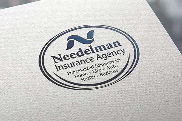 Needelman Insurance Agency logo on textured white paper, with blue oval emblem and tagline text