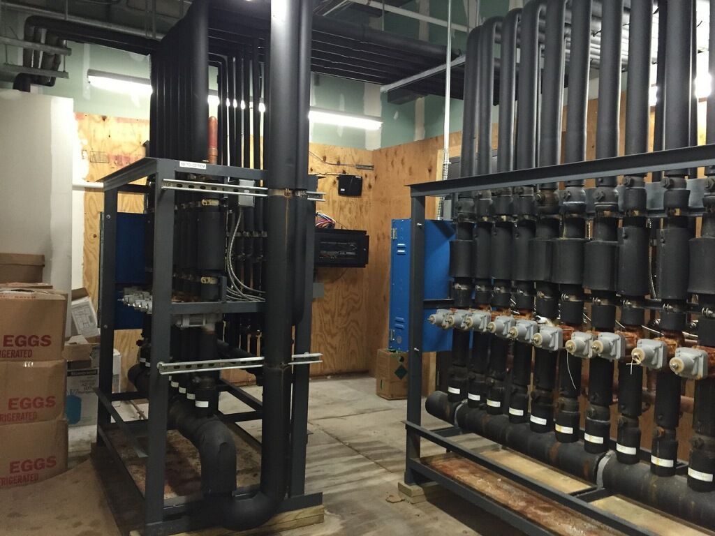 A warehouse filled with lots of pipes and boxes.